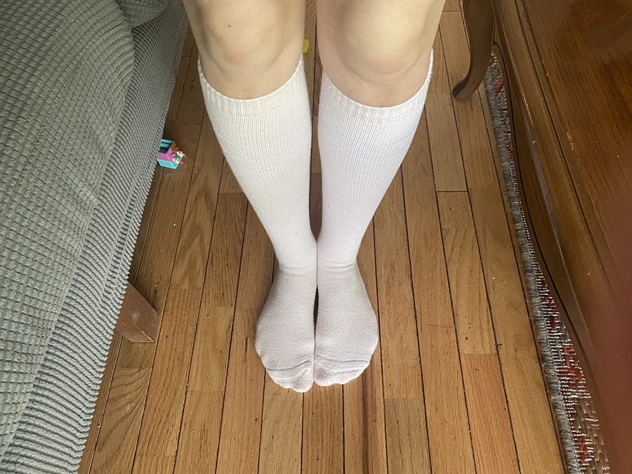 Pregnancy compression socks worn as part of a daily routine
